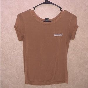 Brown “work of art” tee